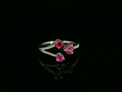 18K white gold open wrap ring with rubies and diamond accents by Emirates Diamonds