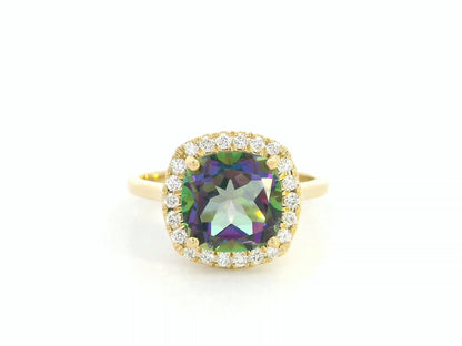 18K yellow gold ring featuring a 2.96 carat Mystic Quartz with diamond halo by Emirates Diamonds