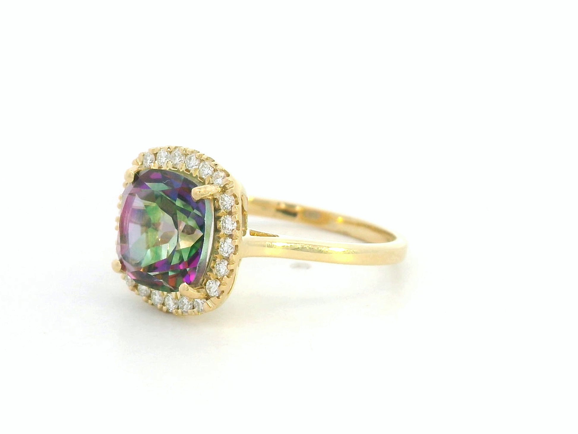 18K yellow gold ring featuring a 2.96 carat Mystic Quartz with diamond halo by Emirates Diamonds