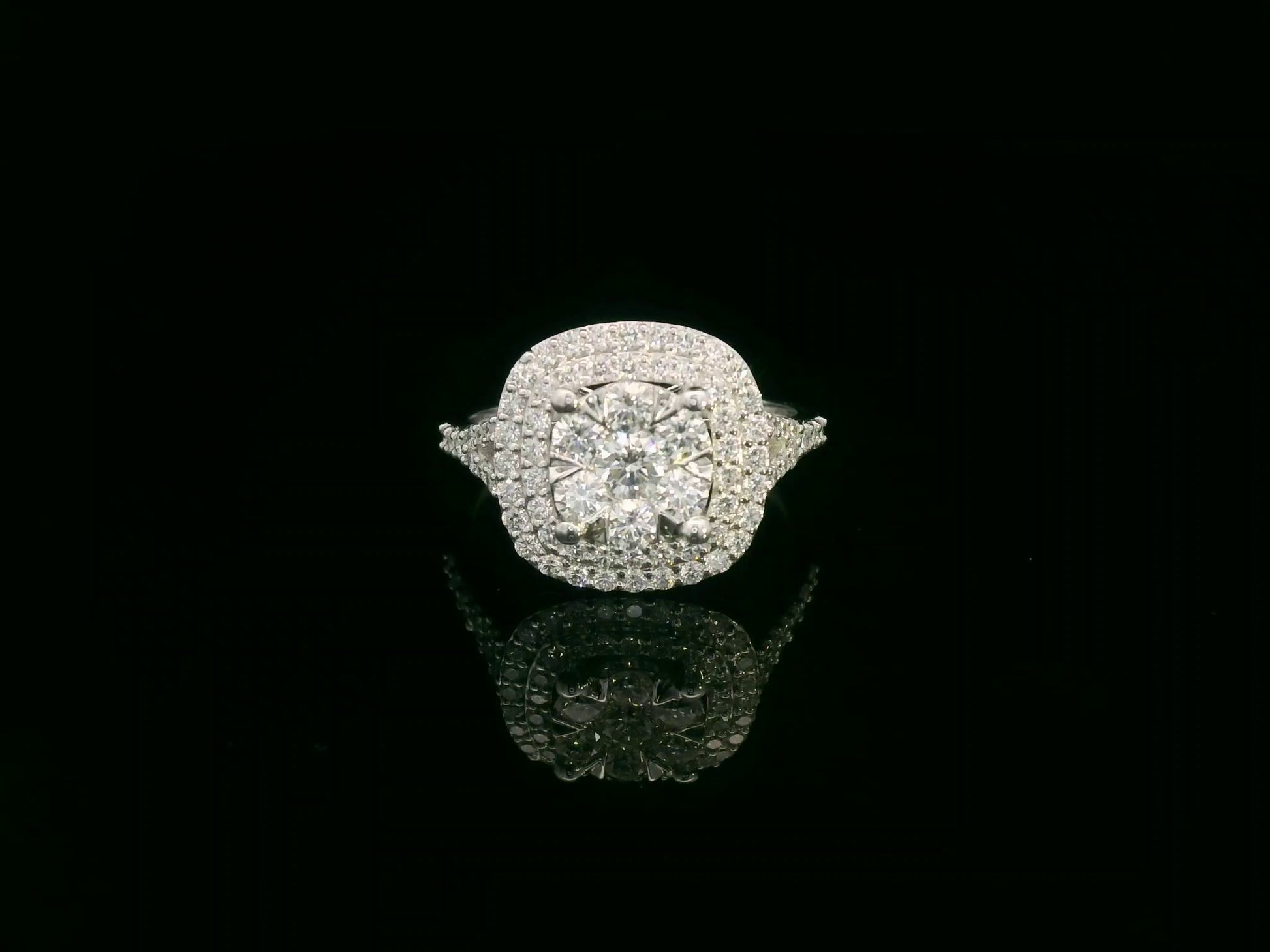 18K white gold double halo diamond engagement ring with pavé-set band, luxury fine jewelry by Emirates Diamonds.