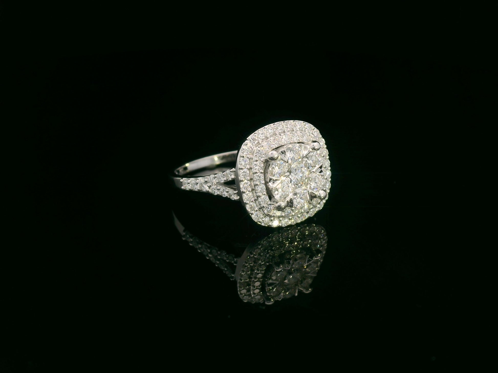 18K white gold double halo diamond engagement ring with pavé-set band, luxury fine jewelry by Emirates Diamonds.