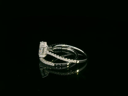 18K white gold oval diamond bridal ring set with IGI certified diamond and matching wedding band by Emirates Diamonds.