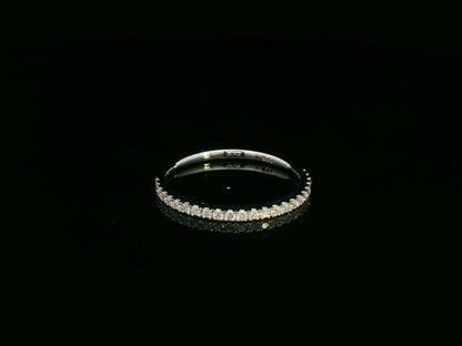 18K white gold oval diamond bridal ring set with IGI certified diamond and matching wedding band by Emirates Diamonds.