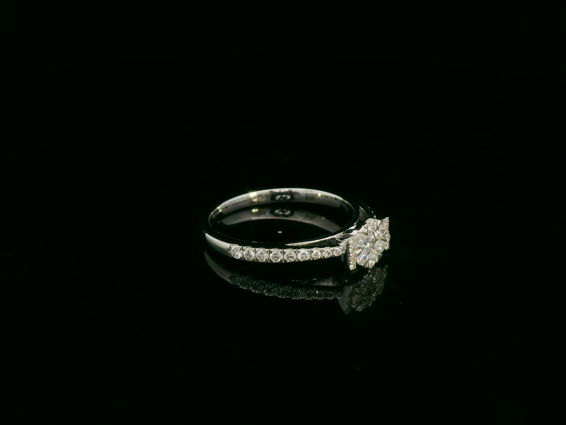 18K white gold diamond cluster ring with pavé diamond band, elegant engagement and everyday ring by Emirates Diamonds.