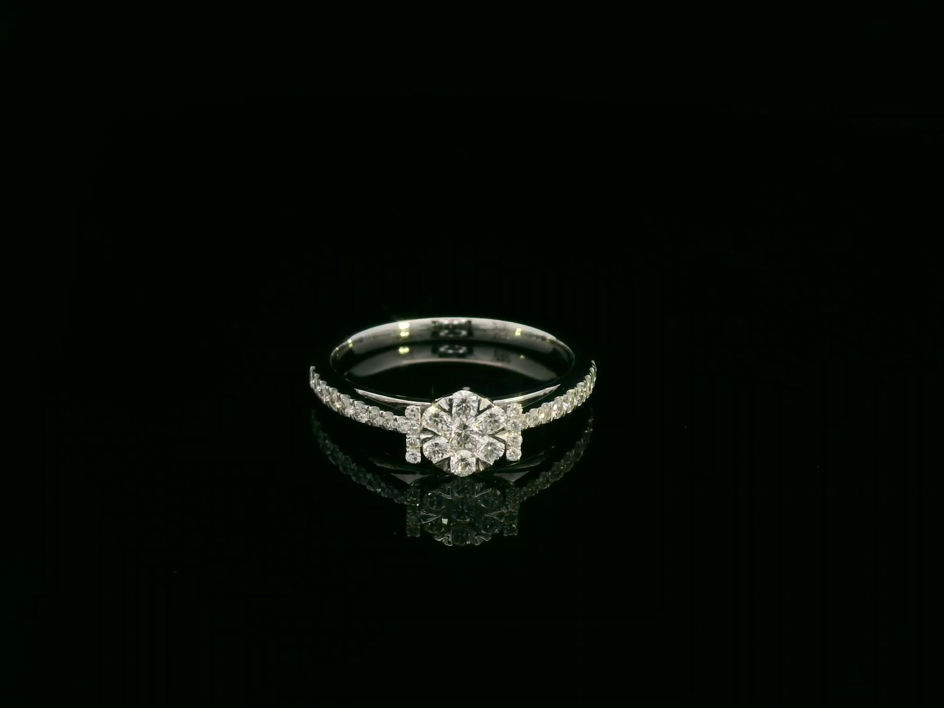 18K white gold diamond cluster ring with pavé diamond band, elegant engagement and everyday ring by Emirates Diamonds.