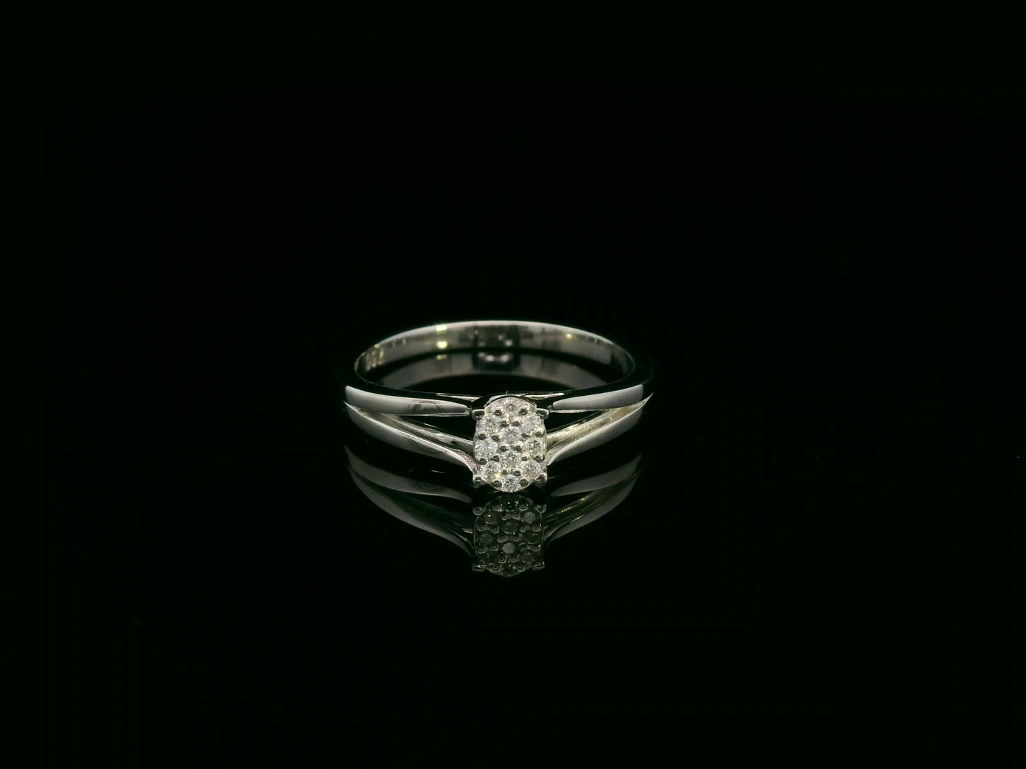 Minimal diamond accent ring in 18K white gold by Emirates Diamonds
