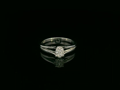 Minimal diamond accent ring in 18K white gold by Emirates Diamonds