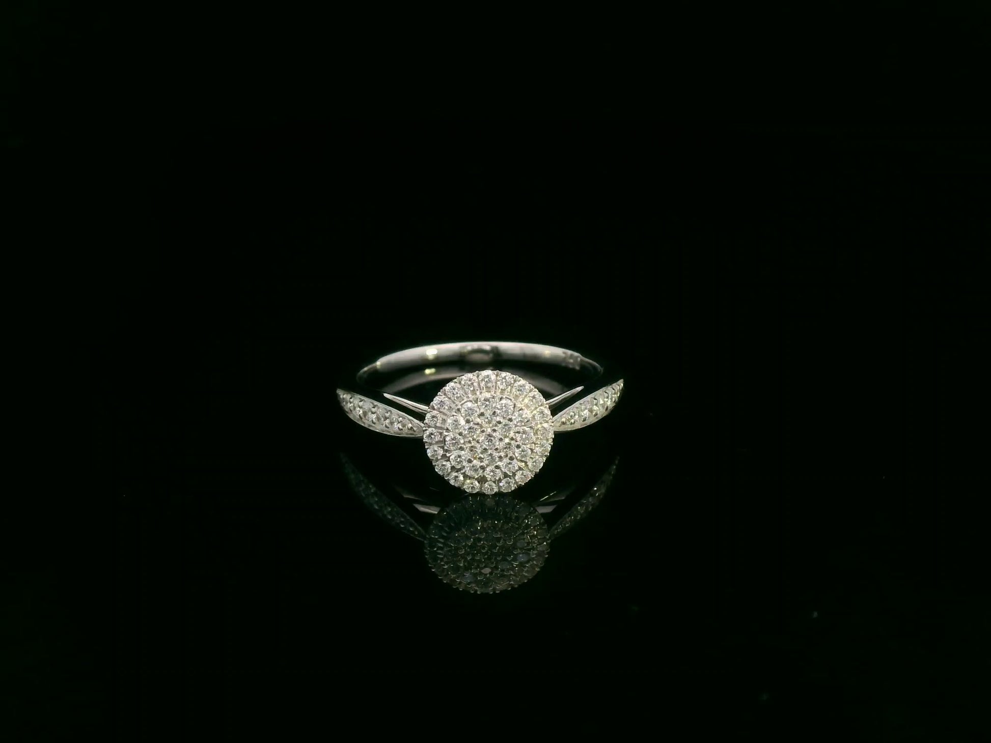 0.38 carat diamond cluster halo ring in 18K white gold with pavé band by Emirates Diamonds