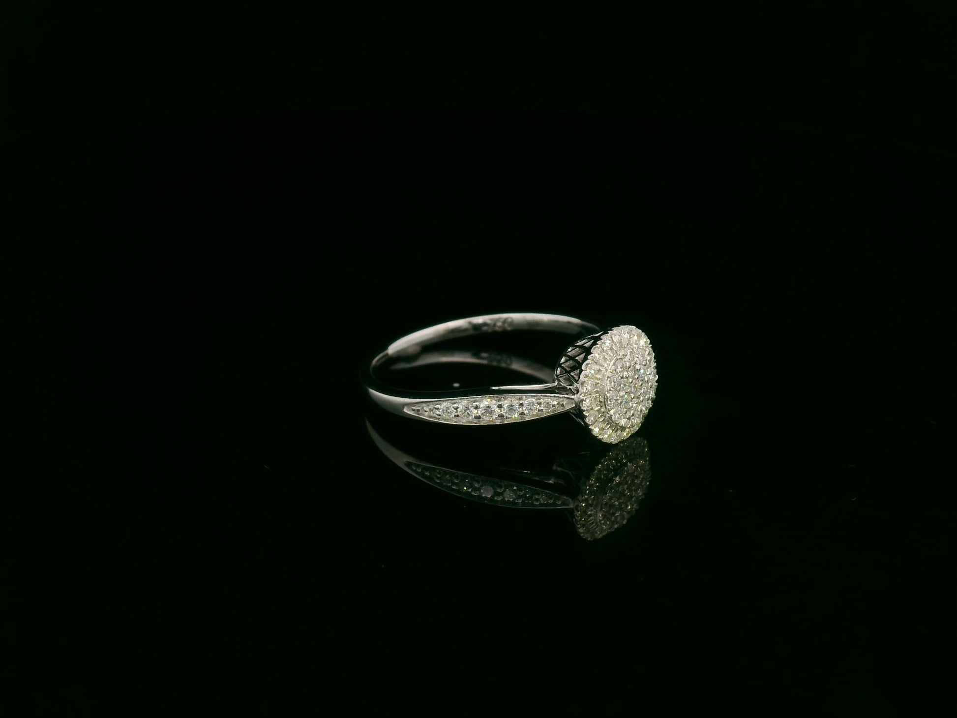0.38 carat diamond cluster halo ring in 18K white gold with pavé band by Emirates Diamonds