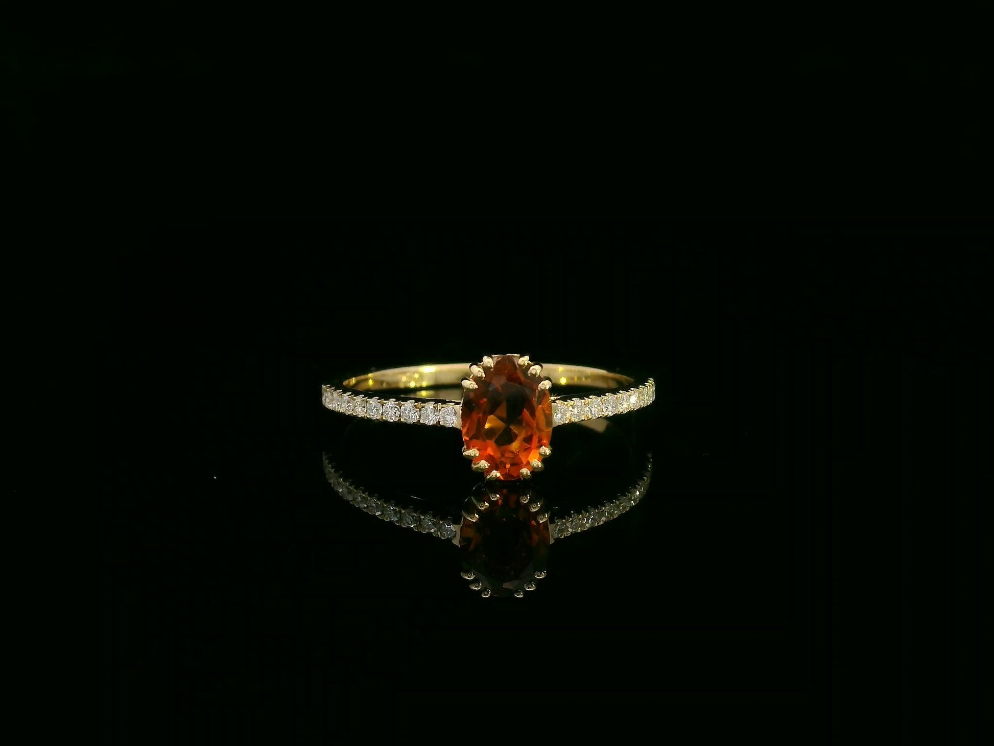 Oval citrine and diamond ring in 18K yellow gold with pavé diamond band by Emirates Diamonds