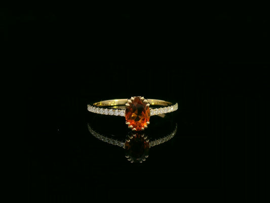 Oval citrine and diamond ring in 18K yellow gold with pavé diamond band by Emirates Diamonds