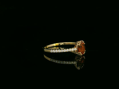 Oval citrine and diamond ring in 18K yellow gold with pavé diamond band by Emirates Diamonds