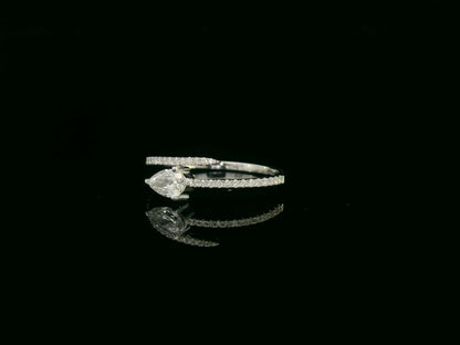 18K white gold diamond bypass ring with pear-cut diamond on one end and pavé diamond sweep, total diamond weight 0.43 carat – Emirates Diamonds
