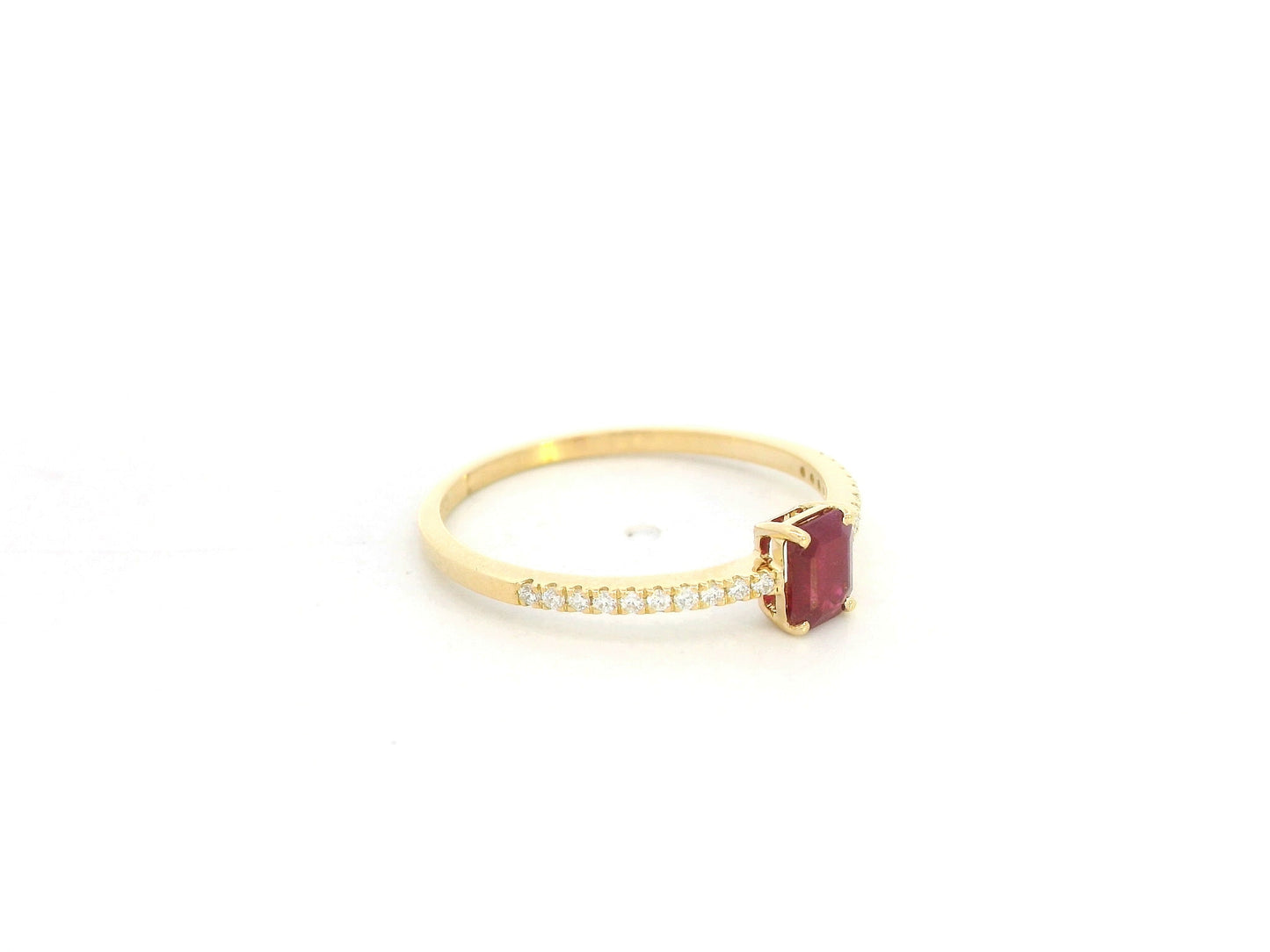 Ruby and diamond minimal ring in 18K yellow gold by Emirates Diamonds.