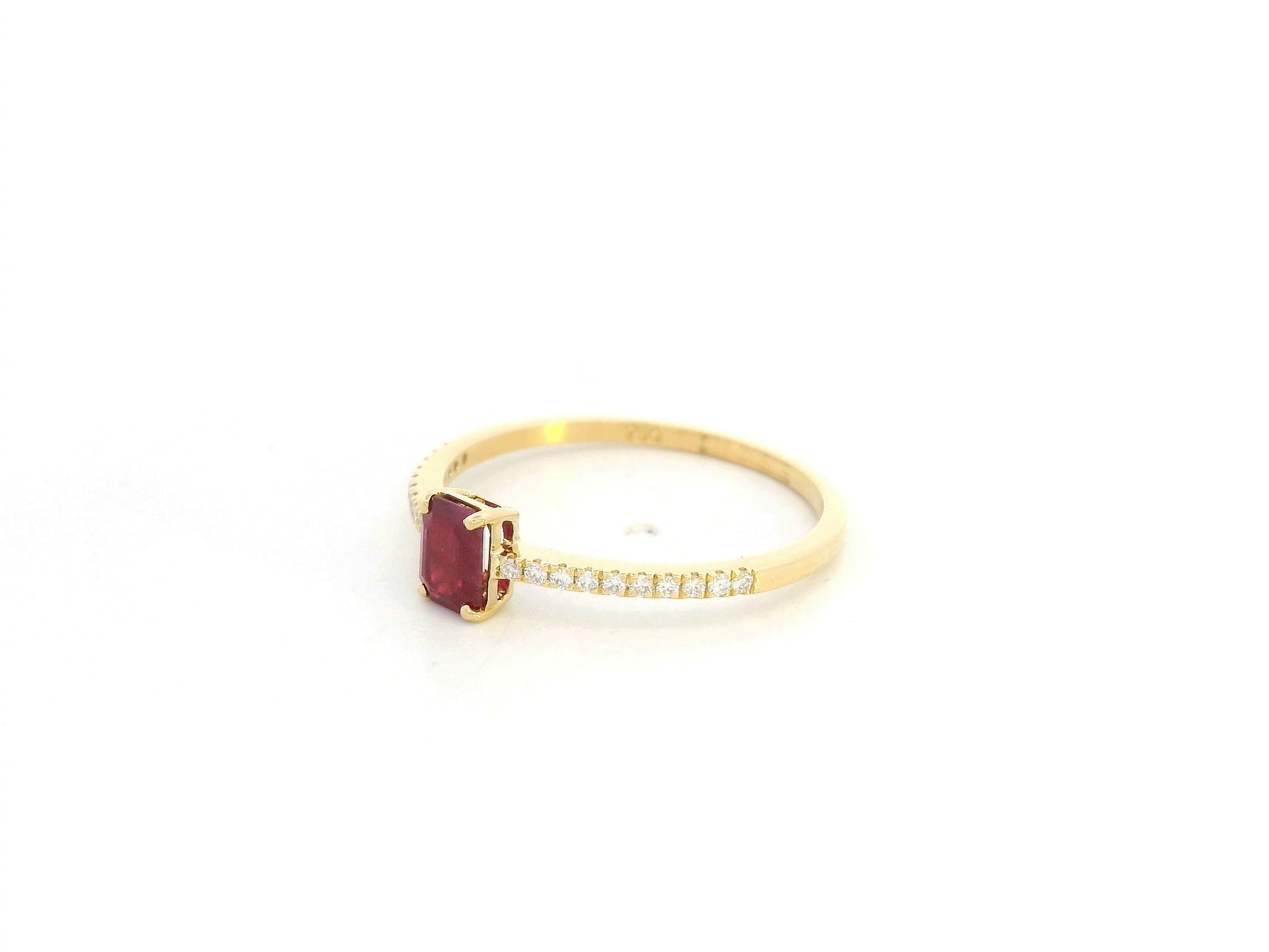 Ruby and diamond minimal ring in 18K yellow gold by Emirates Diamonds.