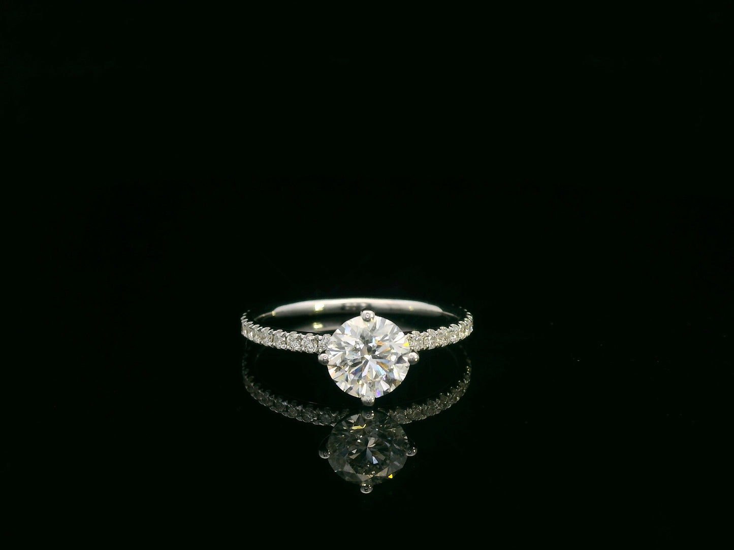 Diamond bridal ring set with GIA certified center stone in 18K white gold by Emirates Diamonds