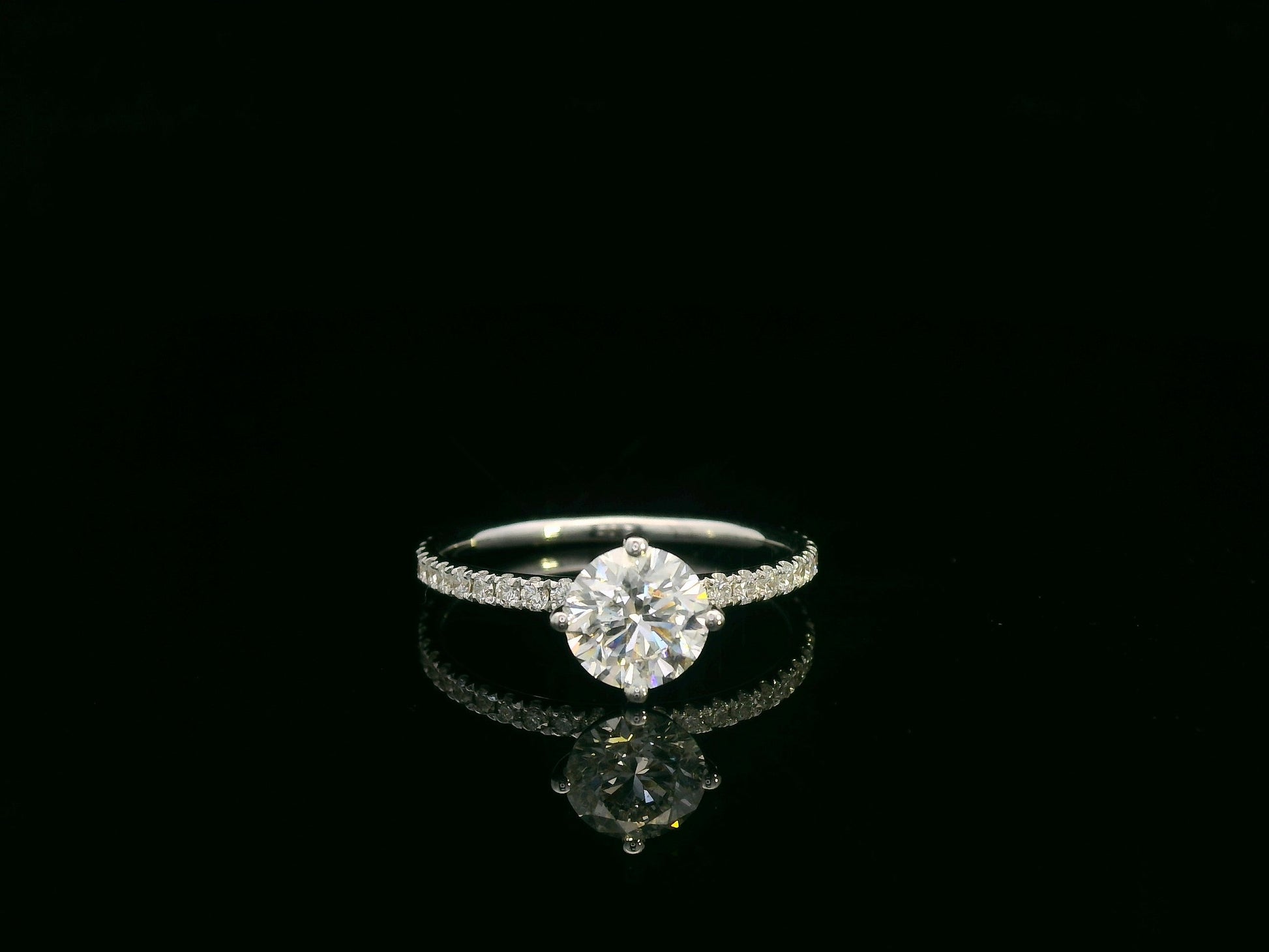 Diamond bridal ring set with GIA certified center stone in 18K white gold by Emirates Diamonds