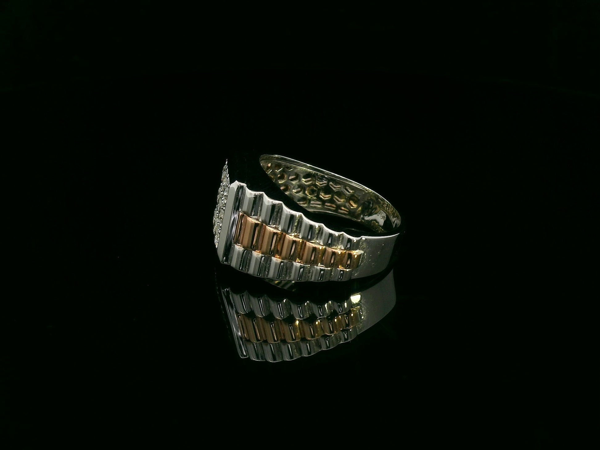 Men’s diamond statement ring in two-tone 18K white and rose gold by Emirates Diamonds.