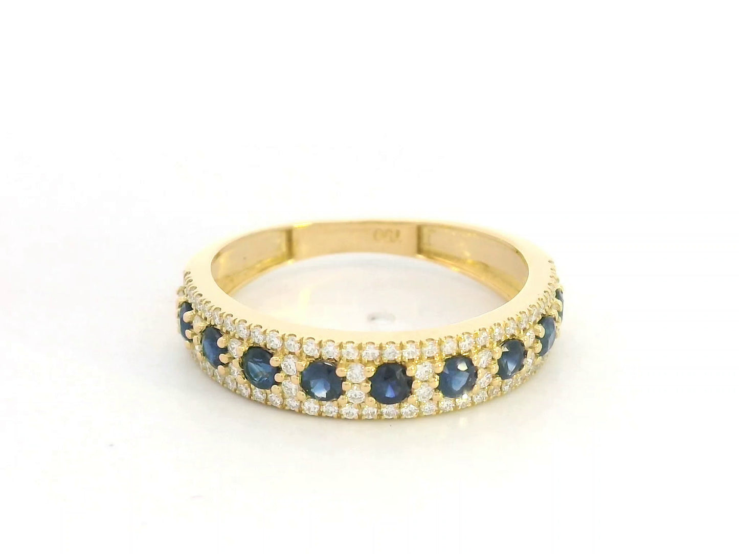 Blue sapphire and diamond band ring in 18K yellow gold by Emirates Diamonds