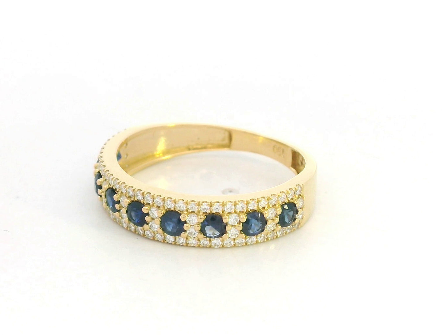 Blue sapphire and diamond band ring in 18K yellow gold by Emirates Diamonds