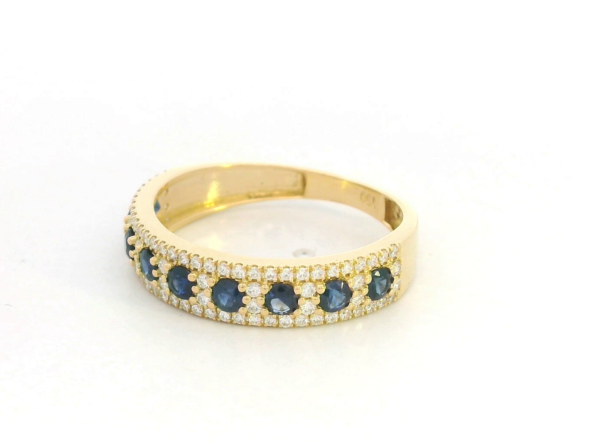 Blue sapphire and diamond band ring in 18K yellow gold by Emirates Diamonds