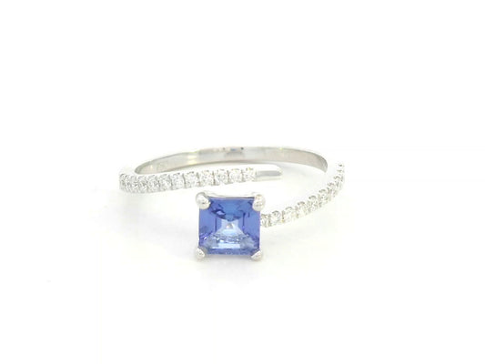 0.57 carat square emerald-cut tanzanite and diamond crossover ring in 18K white gold by Emirates Diamonds