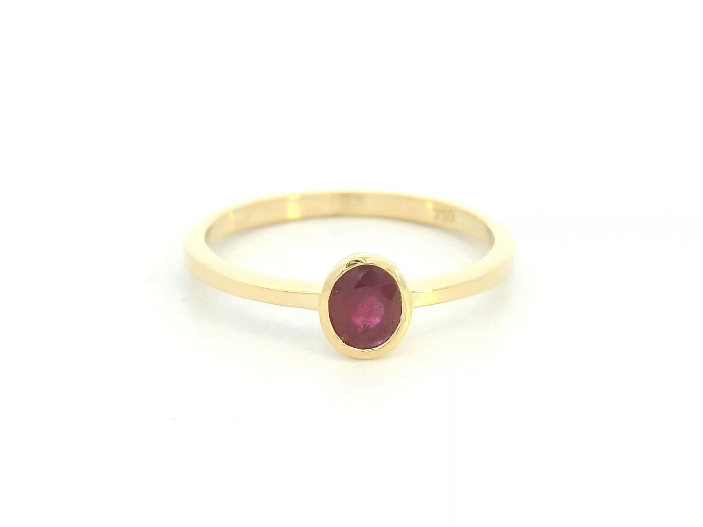 18K yellow gold ruby solitaire ring with bezel setting by Emirates Diamonds