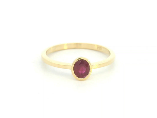 18K yellow gold ruby solitaire ring with bezel setting by Emirates Diamonds