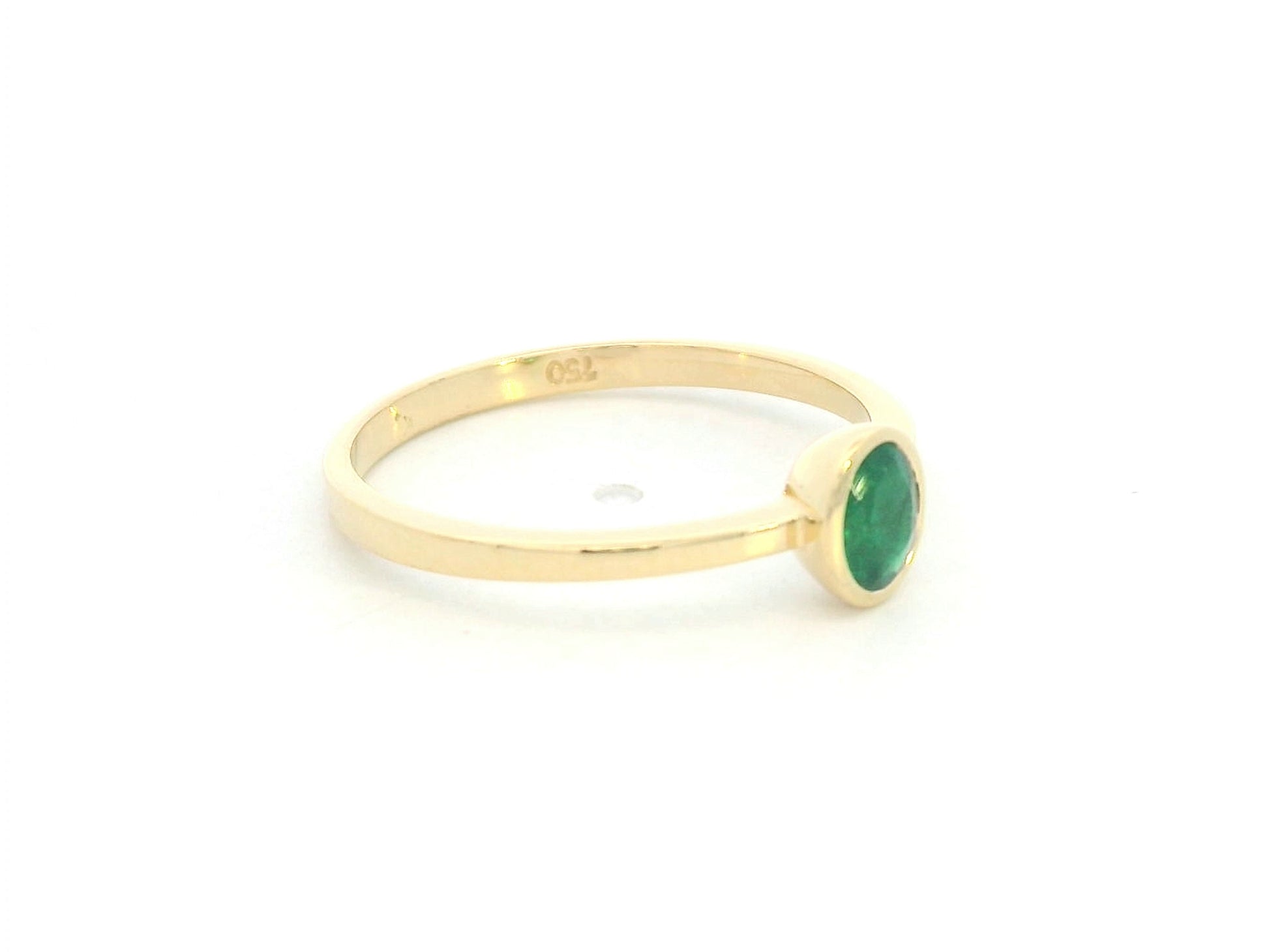 18K yellow gold emerald solitaire ring with bezel setting by Emirates Diamonds