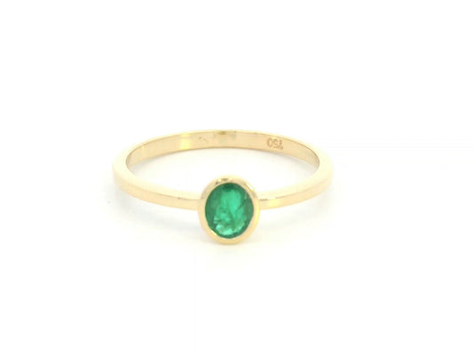 18K yellow gold emerald solitaire ring with bezel setting by Emirates Diamonds