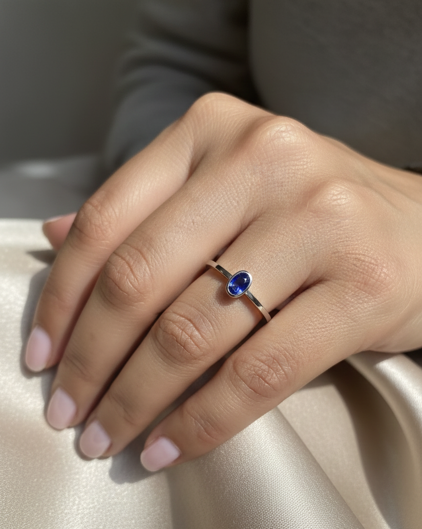 Blue sapphire solitaire ring 0.55 carat oval sapphire in 18K white gold by Emirates Diamonds
