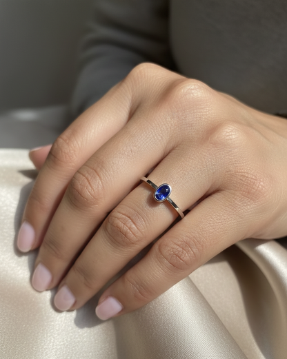 Blue sapphire solitaire ring 0.55 carat oval sapphire in 18K white gold by Emirates Diamonds