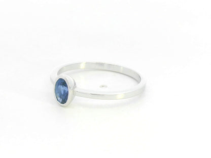 Blue sapphire solitaire ring 0.55 carat oval sapphire in 18K white gold by Emirates Diamonds