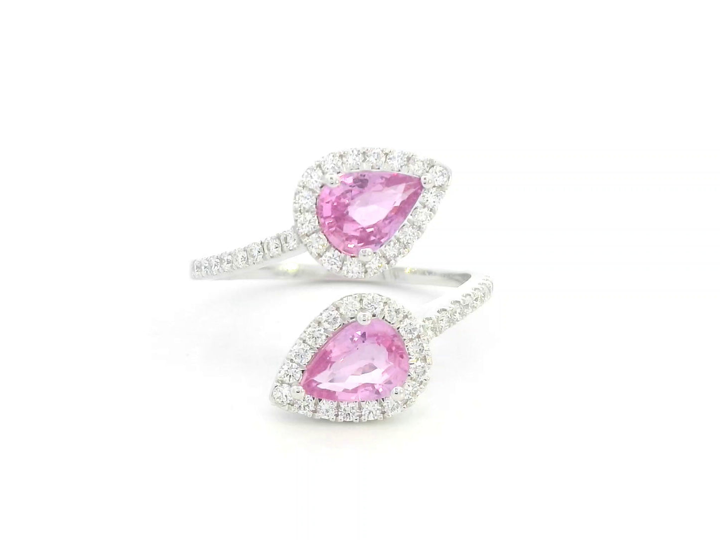 18K white gold open ring with pear-shaped pink sapphires and diamond halos by Emirates Diamonds