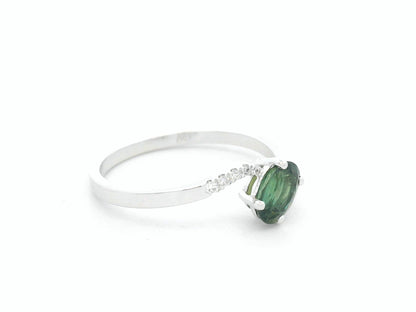 0.86 carat oval green sapphire and diamond ring in 18K white gold by Emirates Diamonds