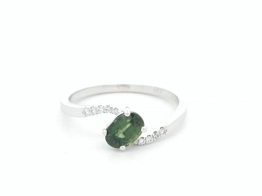 0.86 carat oval green sapphire and diamond ring in 18K white gold by Emirates Diamonds