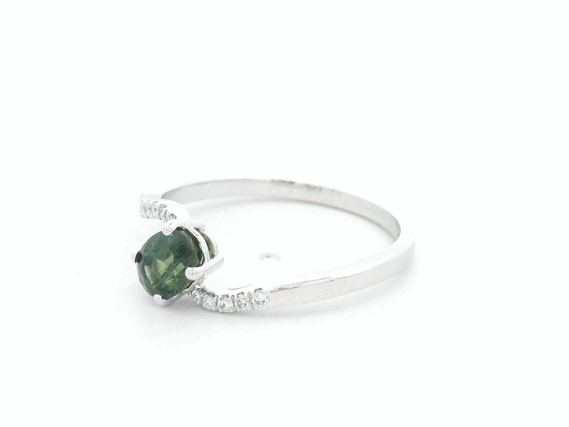 0.86 carat oval green sapphire and diamond ring in 18K white gold by Emirates Diamonds
