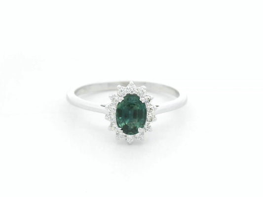 0.74 carat oval green sapphire and diamond halo ring in 18K white gold by Emirates Diamonds