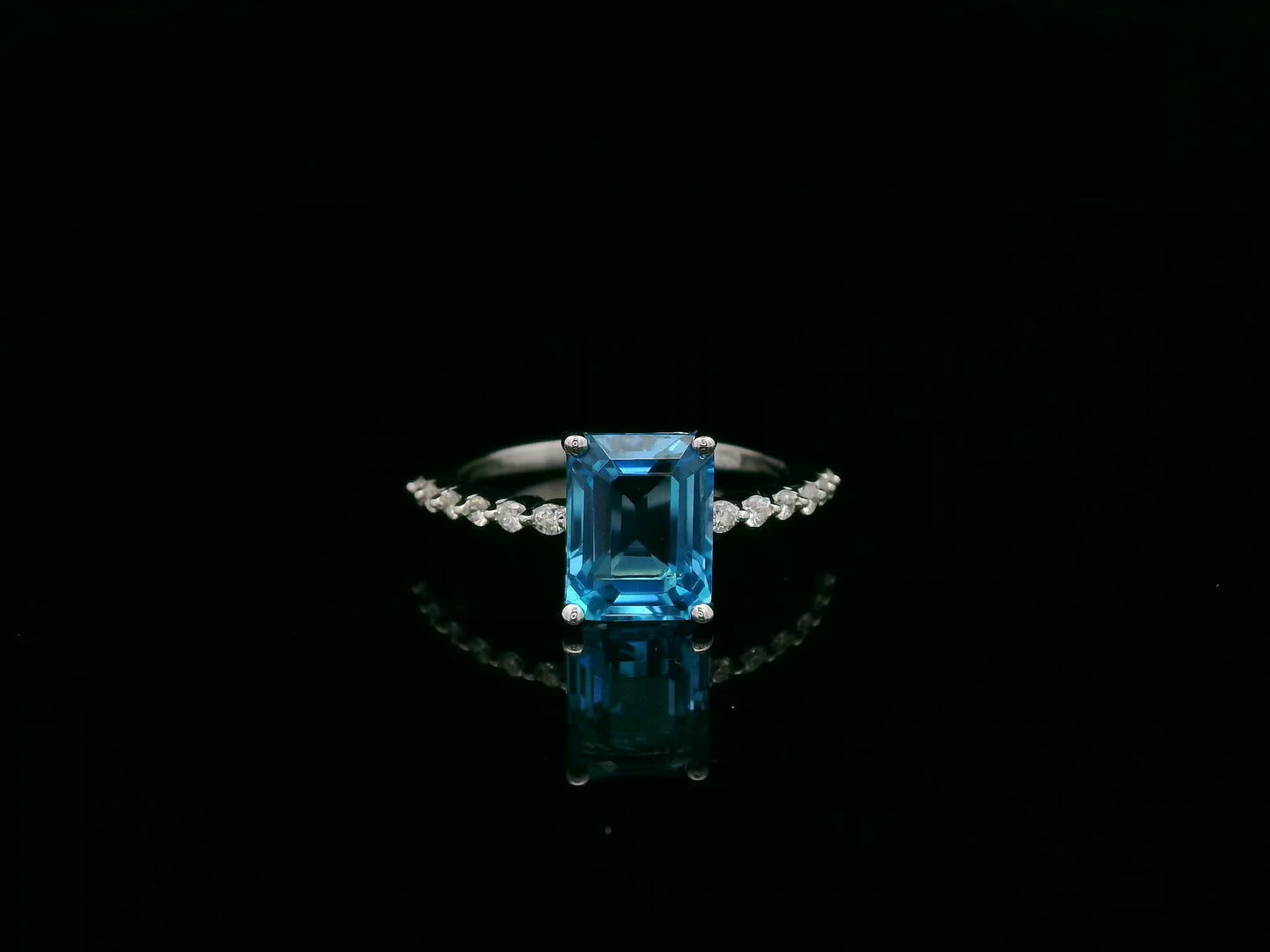 Emerald cut Swiss blue topaz diamond ring in 18K white gold Emirates Diamonds