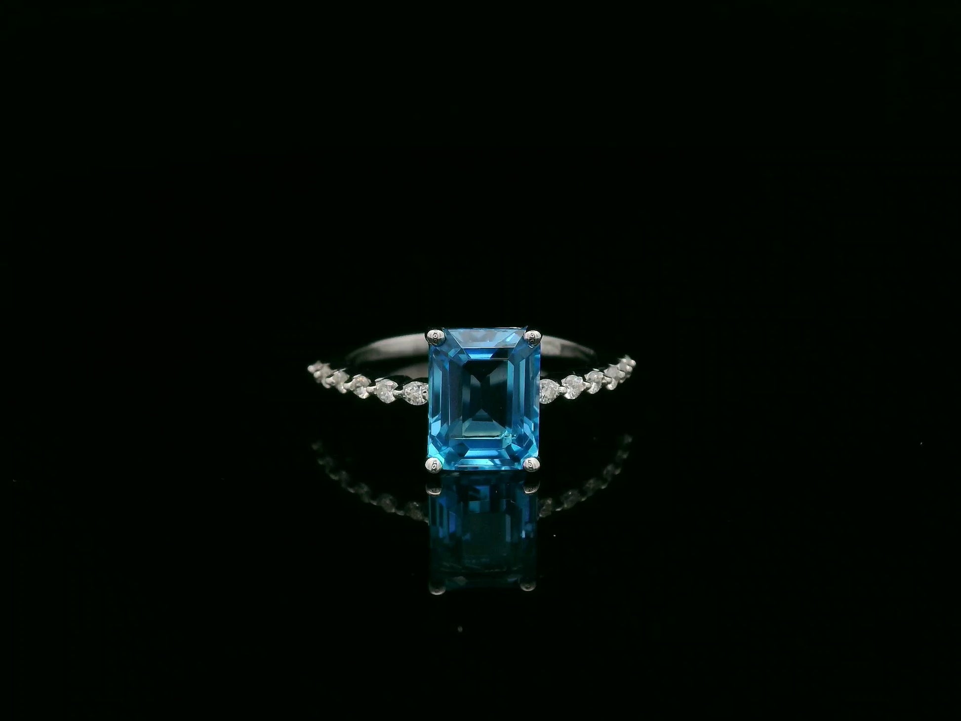 Emerald cut Swiss blue topaz diamond ring in 18K white gold Emirates Diamonds