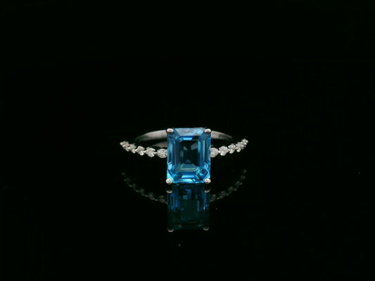 Emerald cut Swiss blue topaz diamond ring in 18K white gold Emirates Diamonds