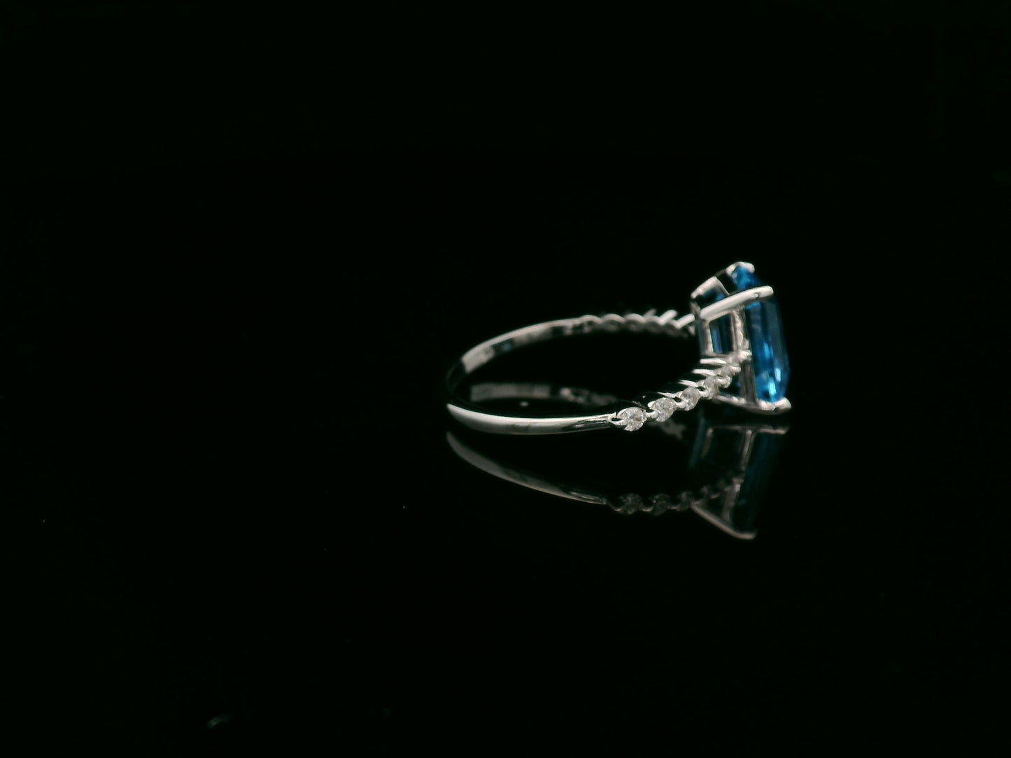 Emerald cut Swiss blue topaz diamond ring in 18K white gold Emirates Diamonds