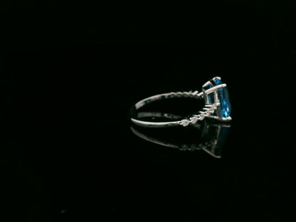 Emerald cut Swiss blue topaz diamond ring in 18K white gold Emirates Diamonds