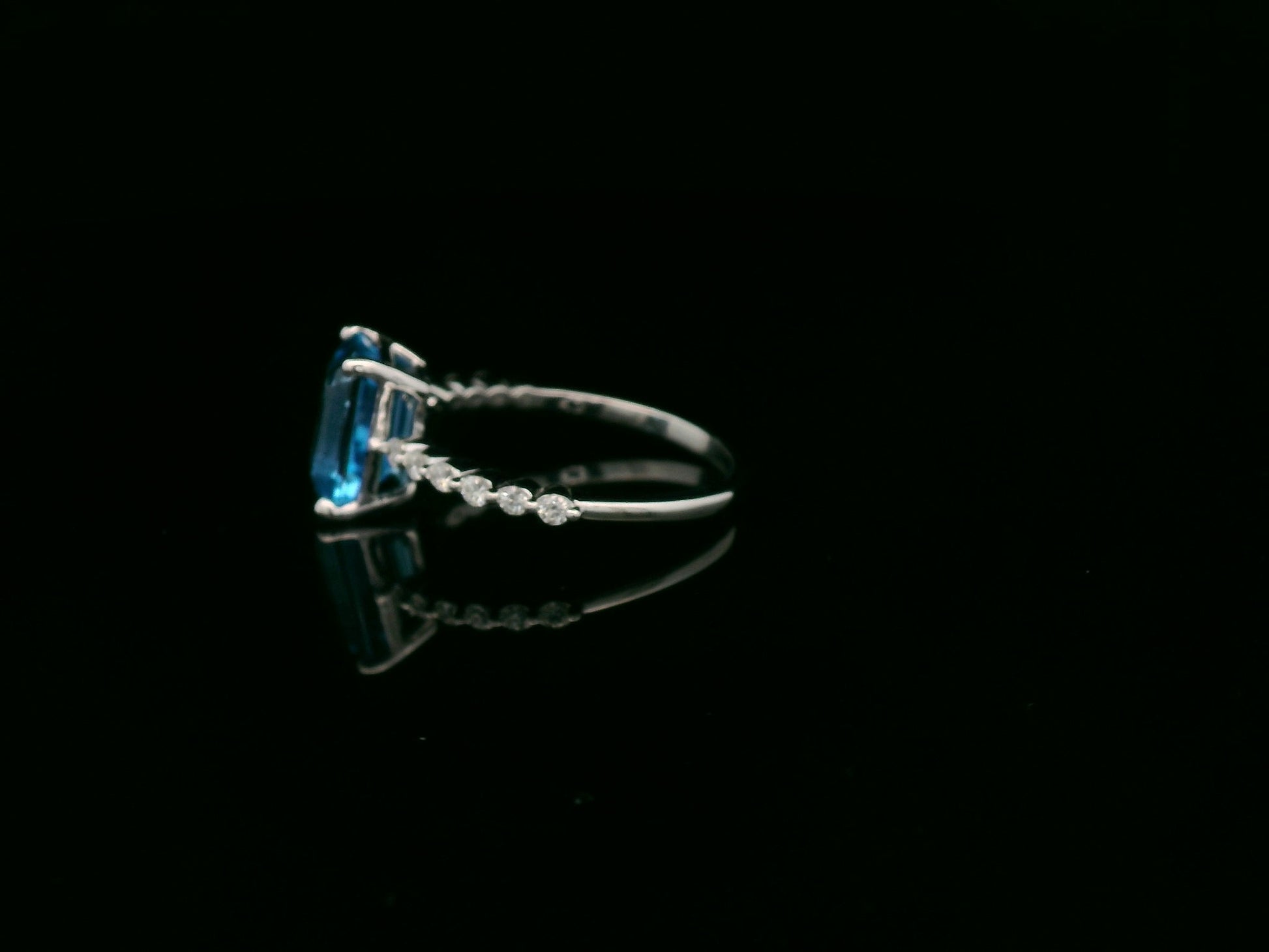 Emerald cut Swiss blue topaz diamond ring in 18K white gold Emirates Diamonds