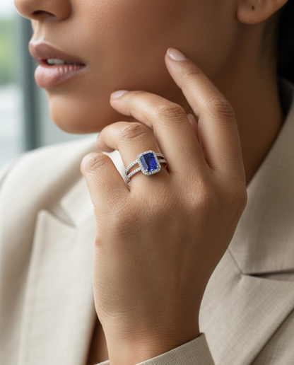 18K white gold tanzanite and diamond bridal ring set with halo engagement ring and diamond wedding band by Emirates Diamonds