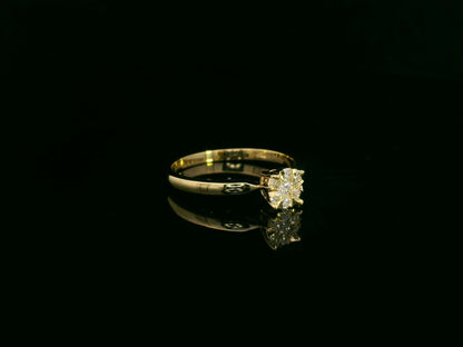 18K yellow gold diamond cluster ring with 0.18 carat round brilliant cut diamonds by Emirates Diamonds