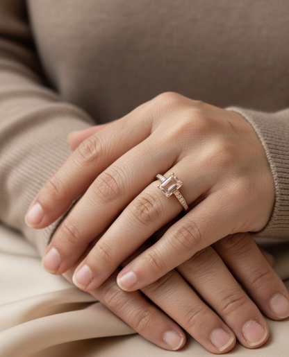 Emerald-cut morganite and diamond ring in 18K rose gold with 1.41 carat morganite and diamond band by Emirates Diamonds.