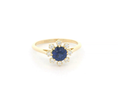 18K yellow gold blue sapphire ring with starburst-style diamond accents, sapphire weight 0.70 carat and total diamond weight 0.14 carat – Emirates Diamonds