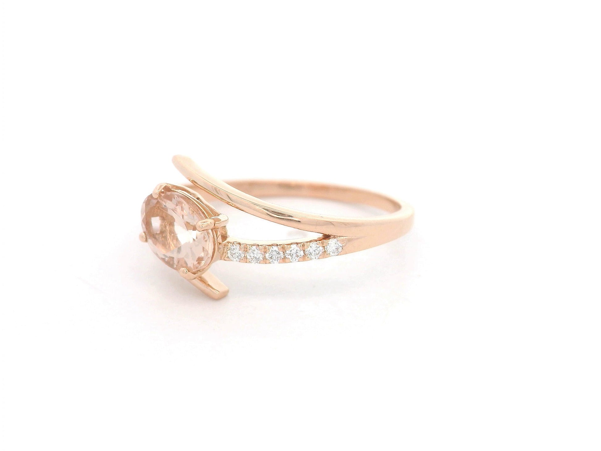18K rose gold oval morganite and diamond crossover ring 0.81 carat by Emirates Diamonds