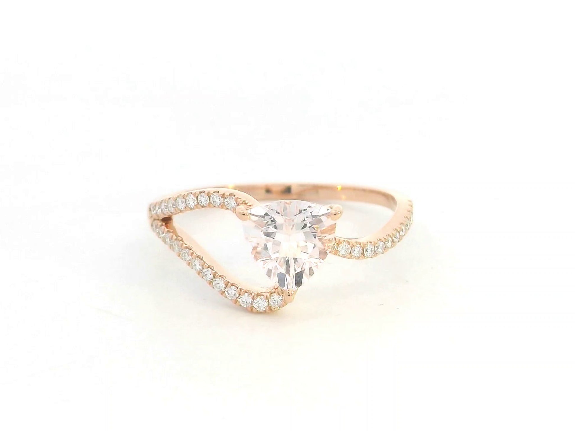 Morganite diamond twist ring in 18K rose gold with pavé band